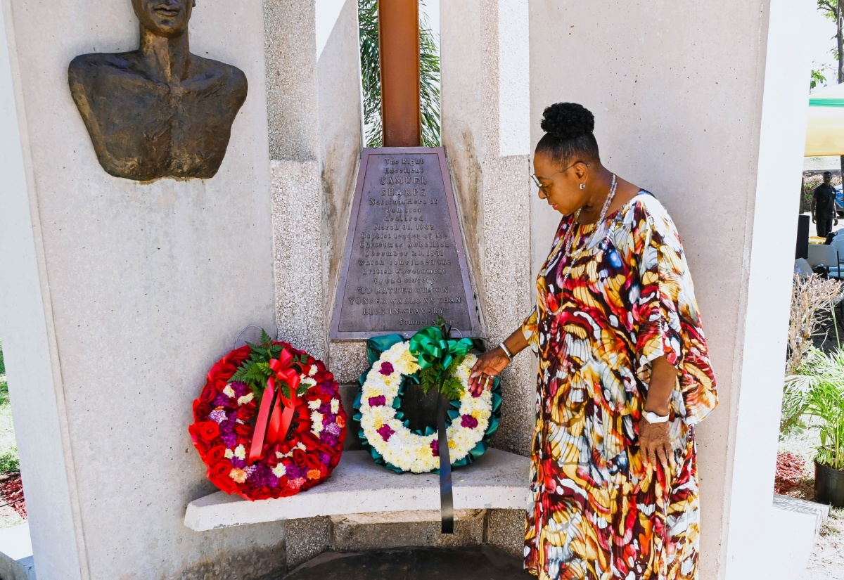 Minister of Culture, Gender, Entertainment and Sport, Hon. Olivia Grange, lays a wreath at the shrine of National Hero, the Rt Excellent Sam Sharpe, at National Heroes Park in Kingston on Labour Day, Thursday (May 23). Sam Sharpe is an iconic figure in the history of resistance to slavery. He was the main instigator of the 1831 Slave Rebellion, which began on the Kensington Estate in St. James, and which was largely instrumental in bringing about the abolition of slavery. Sam Sharpe was hanged on May 23, 1832. In 1834, the Abolition Bill was passed by the British Parliament and in 1838, slavery was abolished.