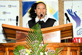 Deputy Chief Education Officer for Curriculum and Support Services at the Ministry of Education and Youth, Dr. Clover Hamilton Flowers, brings greetings at the National Day of Prayer for Children, held on May 29 at the Eastwood Park Road New Testament Church of God, in Kingston.