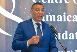 Prime Minister, the Most Hon. Andrew Holness, addresses the Women’s Centre of Jamaica Foundation (WCJF) fundraising dinner at the Jamaica Pegasus Hotel in New Kingston on Saturday (May 18).