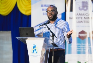 Director of Bauxite Lands at the Jamaica Bauxite Institute (JBI), Kemoy Lindsay, addresses a National Minerals Week conference at Northern Caribbean University (NCU) in Mandeville on May 6.