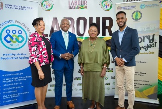 Minister of Culture, Gender, Entertainment and Sport, Hon. Olivia Grange (second right), and Minister of Labour and Social Security, Hon. Pearnel Charles Jr. (second left), are joined by Board Chair, National Council for Senior Citizens (NCSC), Dr. Julian McKoy-Davis (left), and Director, African Caribbean Institute of Jamaica/Jamaica Memory Bank, (ACIJ/JMB), Dr. Kirt Henry, during the Oral History Project launch held on Wednesday (May 15). The event was held at the Culture Ministry in New Kingston. The project, to be undertaken by the National Council for Senior Citizens (NCSC) and African Caribbean Institute of Jamaica/Jamaica Memory Bank, (ACIJ/JMB), will document oral histories of senior citizens with interesting recollections of the country’s history. The goal is to archive these recordings with the ACIJ/JMB for future generations.