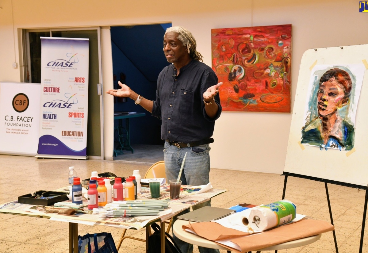 Jamaican artist and Professor Emeritus of Painting at the University of Massachusetts, Dartmouth, Bryan McFarlane, leads the final of three art workshops held recently at the Olympia Gallery in St. Andrew, which benefited over 50 students from Kingston and St. Andrew communities. The workshops were undertaken through funding from the Culture, Health, Arts, Sports and Education (CHASE) Fund.

