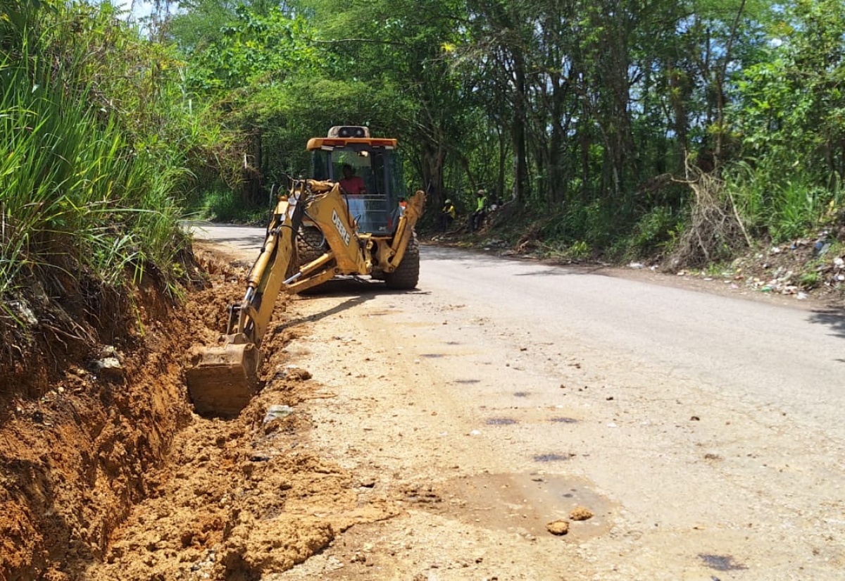 A section of the Burnt Ground main road in Hanover being excavated for the construction of a French drain.

