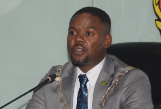 Mayor of Montego Bay, Councillor Richard Vernon, addresses the St. James Municipal Corporation’s monthly meeting on Thursday (May 9). 