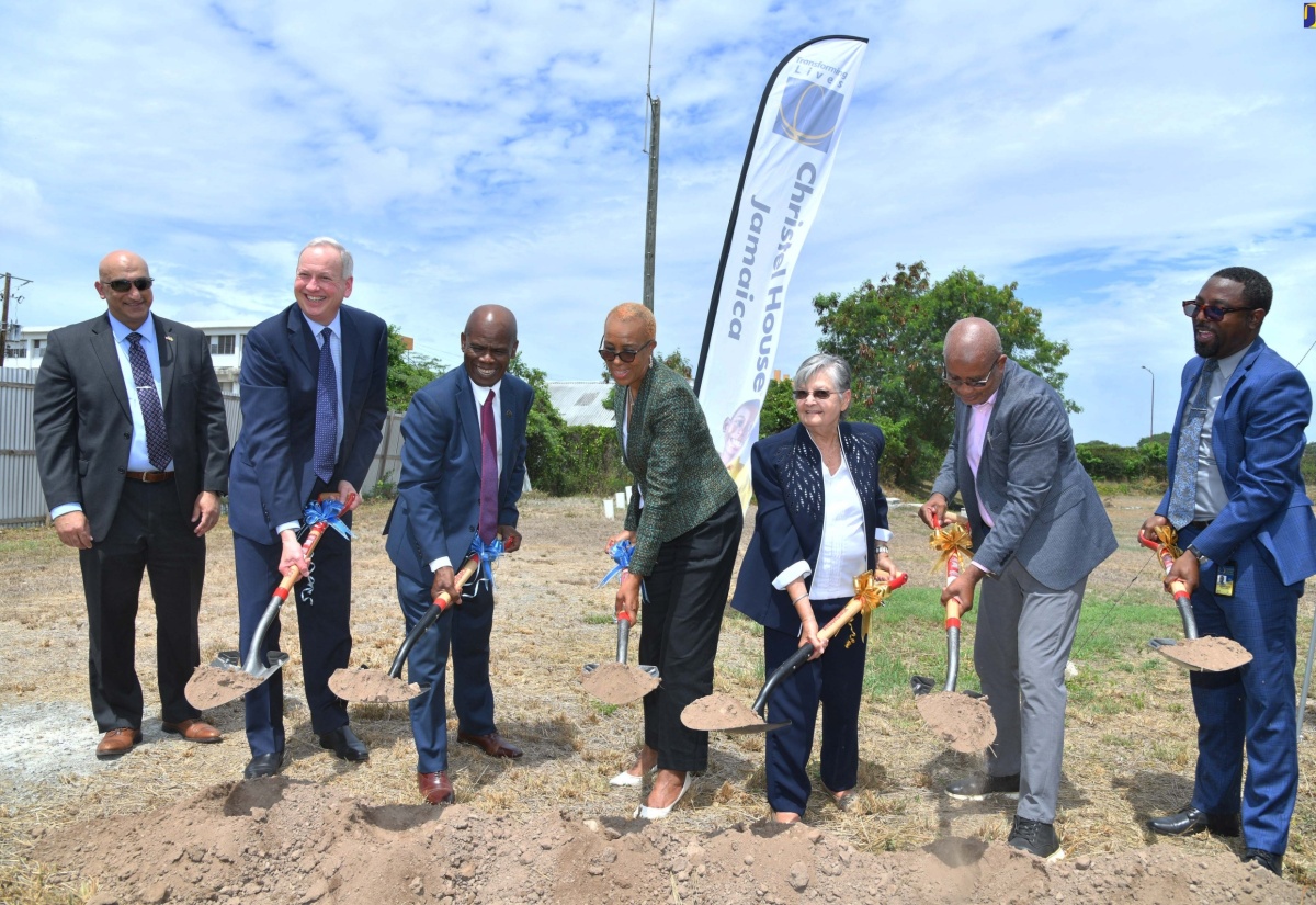 Minister of Education and Youth, Hon. Faval Williams (centre), participates in the ground-breaking for the construction of a high school at Christel House, Twickenham Park in St. Catherine, today (May 1). Also taking part (from left) are Country Representative for the United States Agency for International Development (USAID), Dr. Jaidev Singh; President and Chief Executive Officer of Christel House International, Bart Peterson; Chairman of Christel House Jamaica, Hon. Steadman Fuller, Co-Founder and National Ambassador for Christel House Jamaica, Sally Porteous; Mayor of Spanish Town, Councillor Norman Scott, and Principal of the school, Jason Scott.

