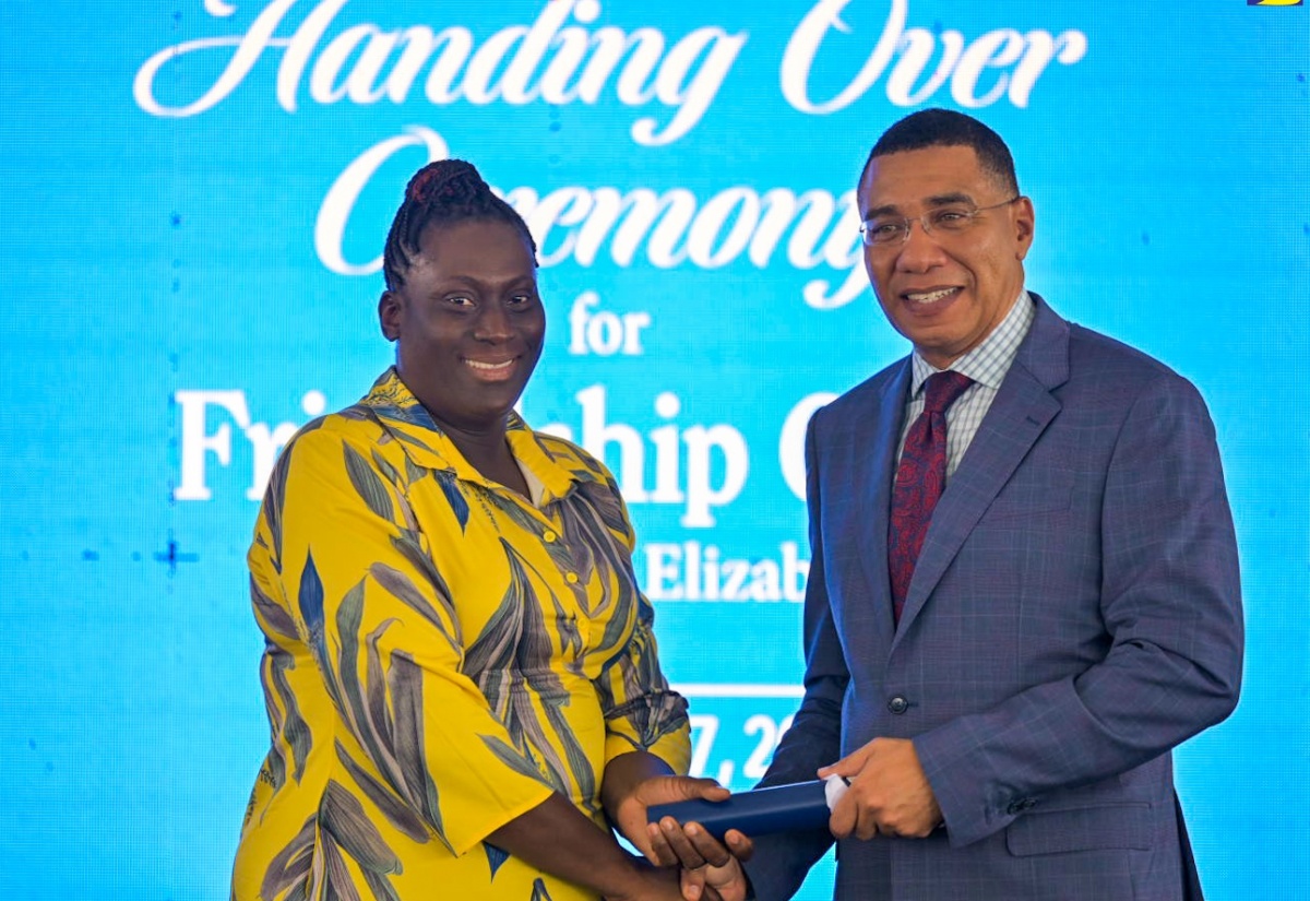 Prime Minister Holness Hands Over 106 Titles To Beneficiaries Of Serviced Lots In Friendship Oaks Phase One