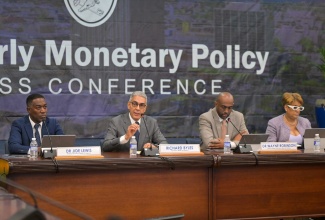 Bank of Jamaica (BOJ) Governor, Richard Byles (second left), responds to a question during the BOJ’s Quarterly Monetary Policy Press Conference on Tuesday (May 21). With him are (from left) BOJ Deputy Governor, Dr. Jide Lewis; BOJ Senior Deputy Governor, Dr. Wayne Robinson; and BOJ Deputy Governor, Natalie Haynes.

