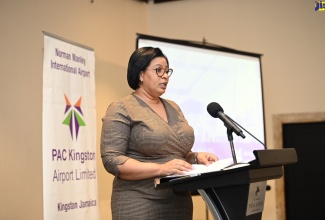 Technical Assistant for Transport in the Ministry of Science, Energy, Telecommunications and Transport, Donaree Muirhead, delivers remarks at the Norman Manley International Airport (NMIA) forum, held on Friday (May 31) at The Jamaica Pegasus hotel in New Kingston. Ms. Muirhead represented portfolio Minister, Hon. Daryl Vaz.
