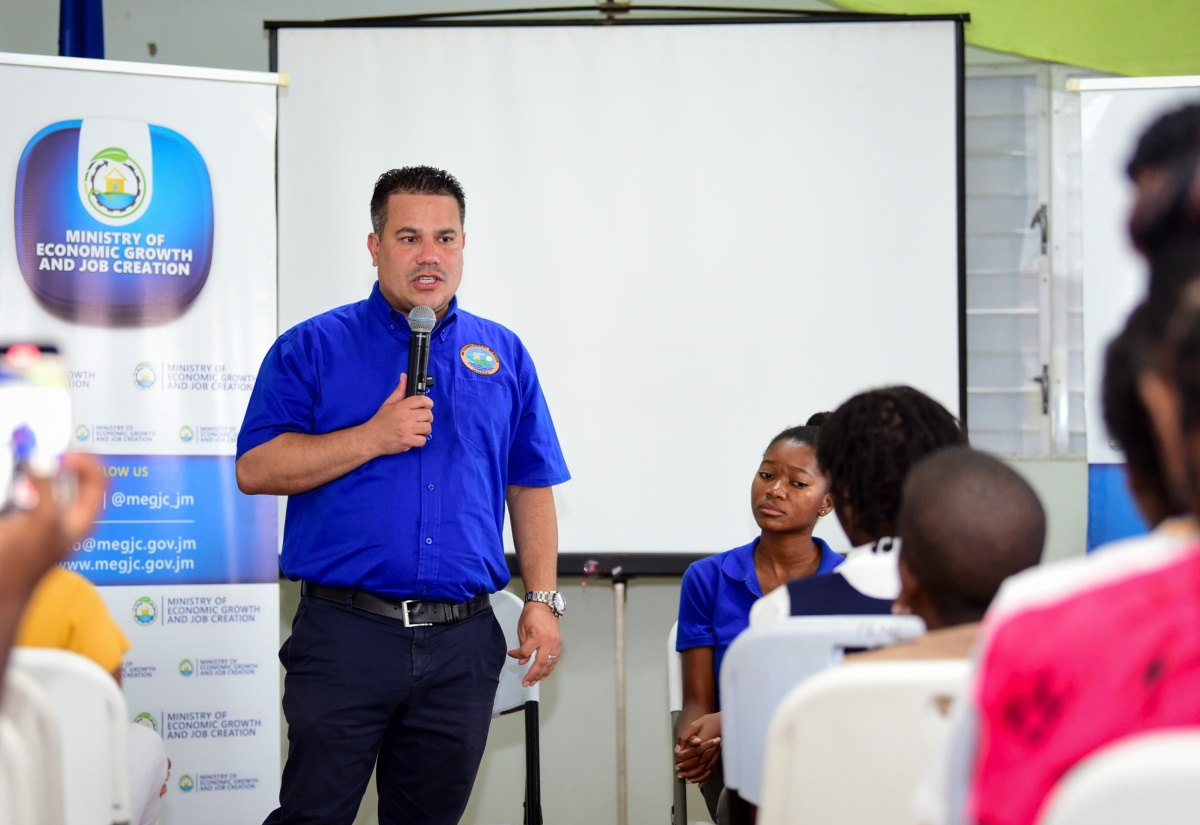Minister without Portfolio in the Ministry of Economic Growth and Job Creation, Senator the Hon. Matthew Samuda, addressing students who visited the Port Royal Marine Lab in Kingston on June 6 in celebration of World Oceans Day.


