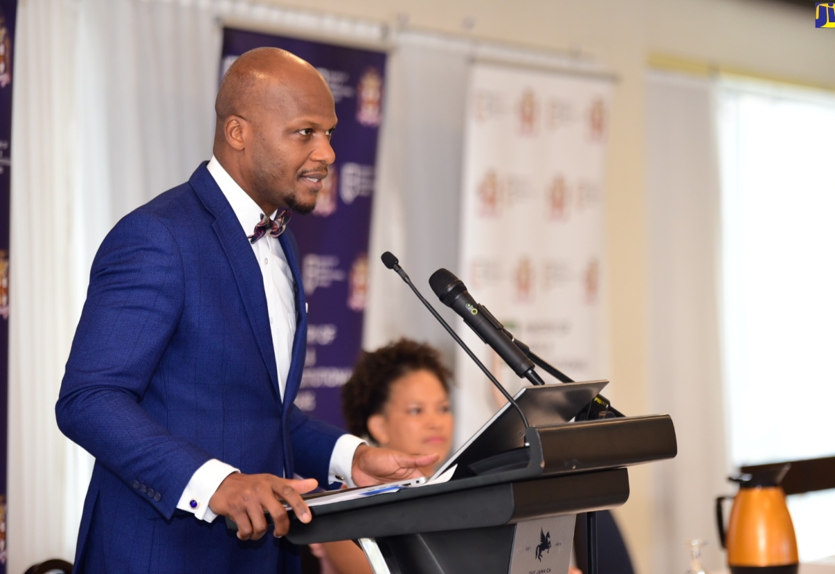 Permanent Secretary in the Ministry of Legal and Constitutional Affairs, Wayne Robertson, addresses a Legislative Policy Development Forum at The Jamaica Pegasus hotel in New Kingston on Thursday (June 13).
