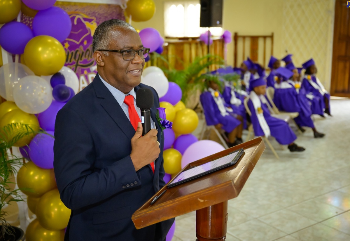 Custos of Manchester, Garfield Green, addresses the Yabnel Preparatory & Care Centre graduation ceremony held on Thursday (June 27) at the Apostolic Church of Jamaica, Goodness & Mercy Temple in Manchester.

