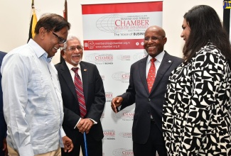 Minister of Industry, Investment and Commerce, Hon. Aubyn Hill (second right), shares a light moment with (from left) Chairman, Standards Council, Jamaica Bureau of Standards, Wilfred Baghaloo; High Commissioner of Trinidad and Tobago to Jamaica, His Excellency Deryck L. Murray; and President of the Trinidad and Tobago Chamber of Industry and Commerce, Kiran Maharaj. Occasion was the opening ceremony for the Chamber’s Trade Mission Jamaica 2024, at The Jamaica Pegasus hotel, New Kingston, on June 26.

