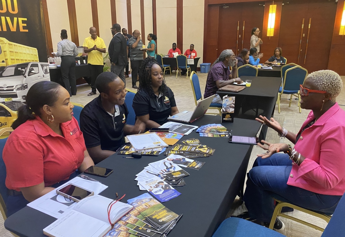 Aspiring business owner, Denise Russell (right), receives advice on public liability insurance from the Marathon Insurance Brokers team (from left) Team Lead, Rashque Rowe; Sales Executive, Keishan Campbell; and Account Executive, Sueyen Thomas. Occasion was the Tourism Product Development Company (TPDCo) Licensing Expo on Tuesday, June 11 at the Montego Bay Convention Centre in St James.