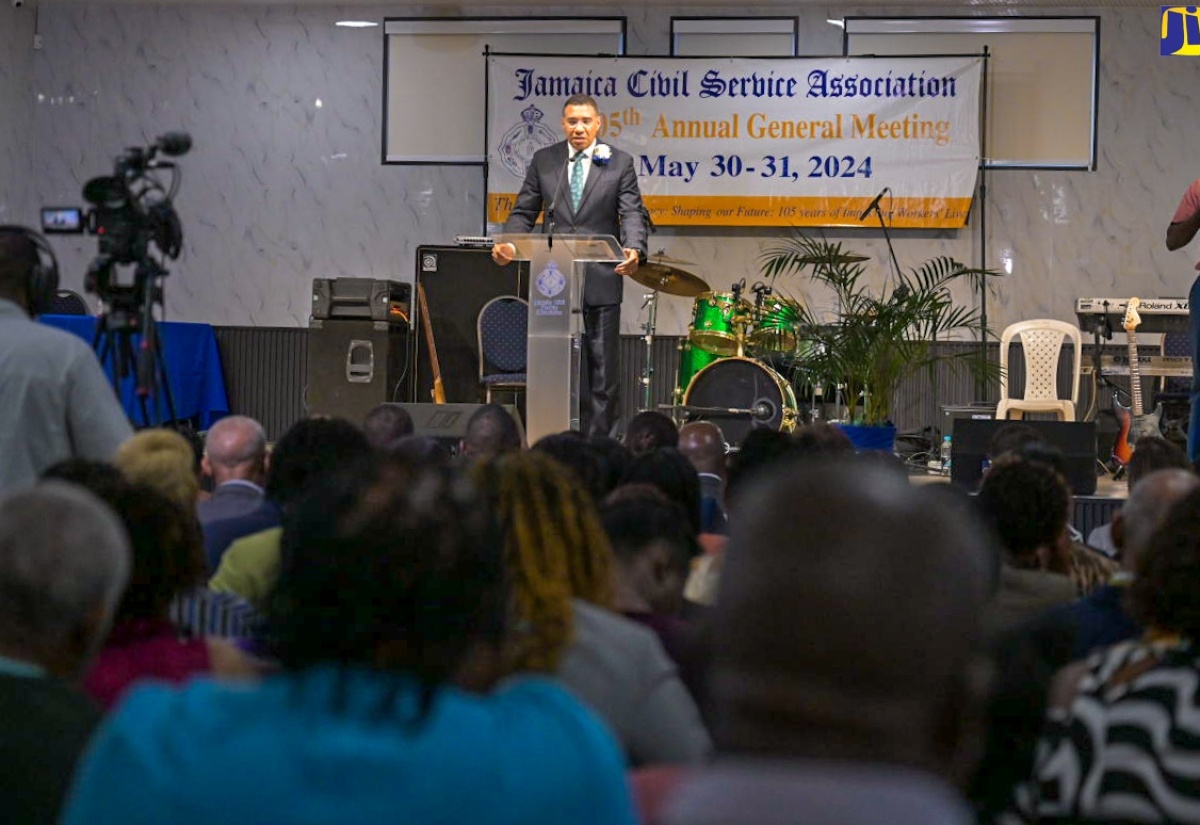 Prime Minister, the Most Hon. Andrew Holness, addresses the Jamaica Civil Service Association (JCSA) 105th annual general meeting at JACISERA Park, in St. Andrew, on May 30.