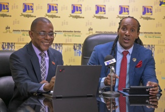 Minister of State in the Ministry of Foreign Affairs and Foreign Trade, Hon. Alando Terrelonge (right), speaks at a Jamaica Information Service (JIS)Think Tank, today (June 6), at the agency’s head office in Kingston. With him is Chair of the Biennial Diaspora Conference, President and Chief Executive Officer (CEO), VM Group, Courtney Campbell.  Discussions focused on preparations for the upcoming Biennial Diaspora Conference from June 16 to 19, to be held at the Montego Bay Convention Centre.

