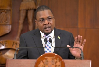 Minister without Portfolio in the Ministry of Economic Growth and Job Creation with responsibility for Works, Hon. Robert Morgan, addresses Wednesday’s (June 12) post-Cabinet press briefing at Jamaica House. 