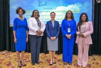 Minister of Foreign Affairs and Foreign Trade, Senator the Hon. Kamina Johnson Smith (centre), shares a moment with (from left) President, Jamaican Women of Florida, Aisha Rainford; High Commissioner of Jamaica to Canada, Marsha Coore Lobban; Ambassador of Jamaica to Belgium and Head of Mission to the European Union (EU), Symone Betton Nayo; and Consul General of Jamaica to New York, Alsion Wilson.  Occasion was a panel discussion during the 10th Biennial Diaspora Conference at the Montego Bay Convention Centre in St. James on June 17.

