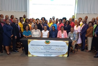 Minister of Education and Youth, Hon. Fayval Williams (seated third left), with principals, teachers, regional heads, and other stakeholders at the Jamaica Association of Principals of Secondary Schools (JAPSS), at their biennial conference at the Ocean Coral Springs Hotel, Trelawny, on June 8. To the Minister’s left is Opposition Spokesperson on Education and Youth, Senator Damion Crawford.

