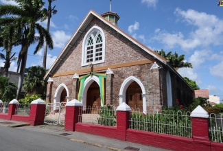 The beautiful St. Thomas Parish Church, located in the capital town of Morant Bay. The brick building was constructed in 1865 – the same year as the Morant Bay Rebellion – when the original Church situated at Church Corner was abandoned because of dilapidation. The east wall of the Church has a brick with the date 1865 baked into it.
