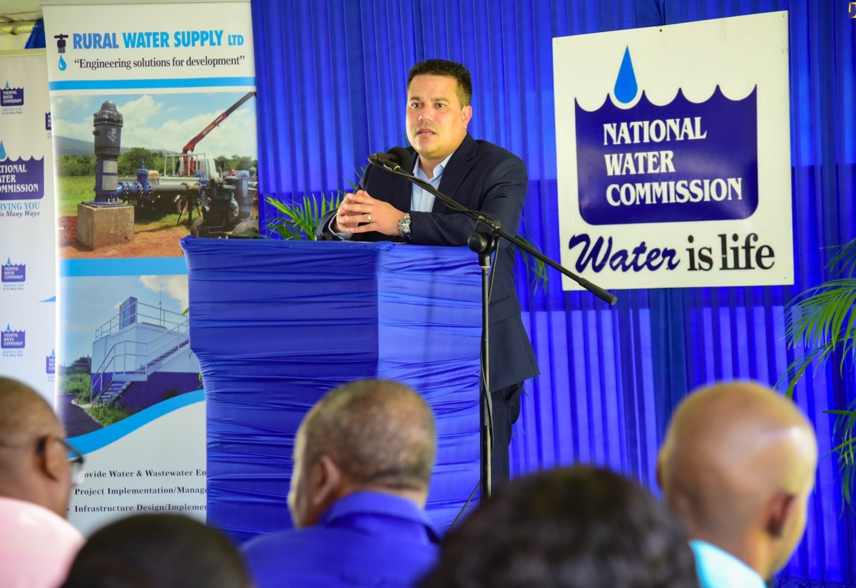 Minister without Portfolio in the Ministry of Economic Growth and Job Creation, Senator the Hon. Matthew Samuda, addresses the ground-breaking ceremony for the Mason Hall Water Supply Project held at the Mason Hall Primary School in the parish on July 18. This first phase of the project will see the extension of transmission and distribution pipelines that will provide safe, reliable service to residents.