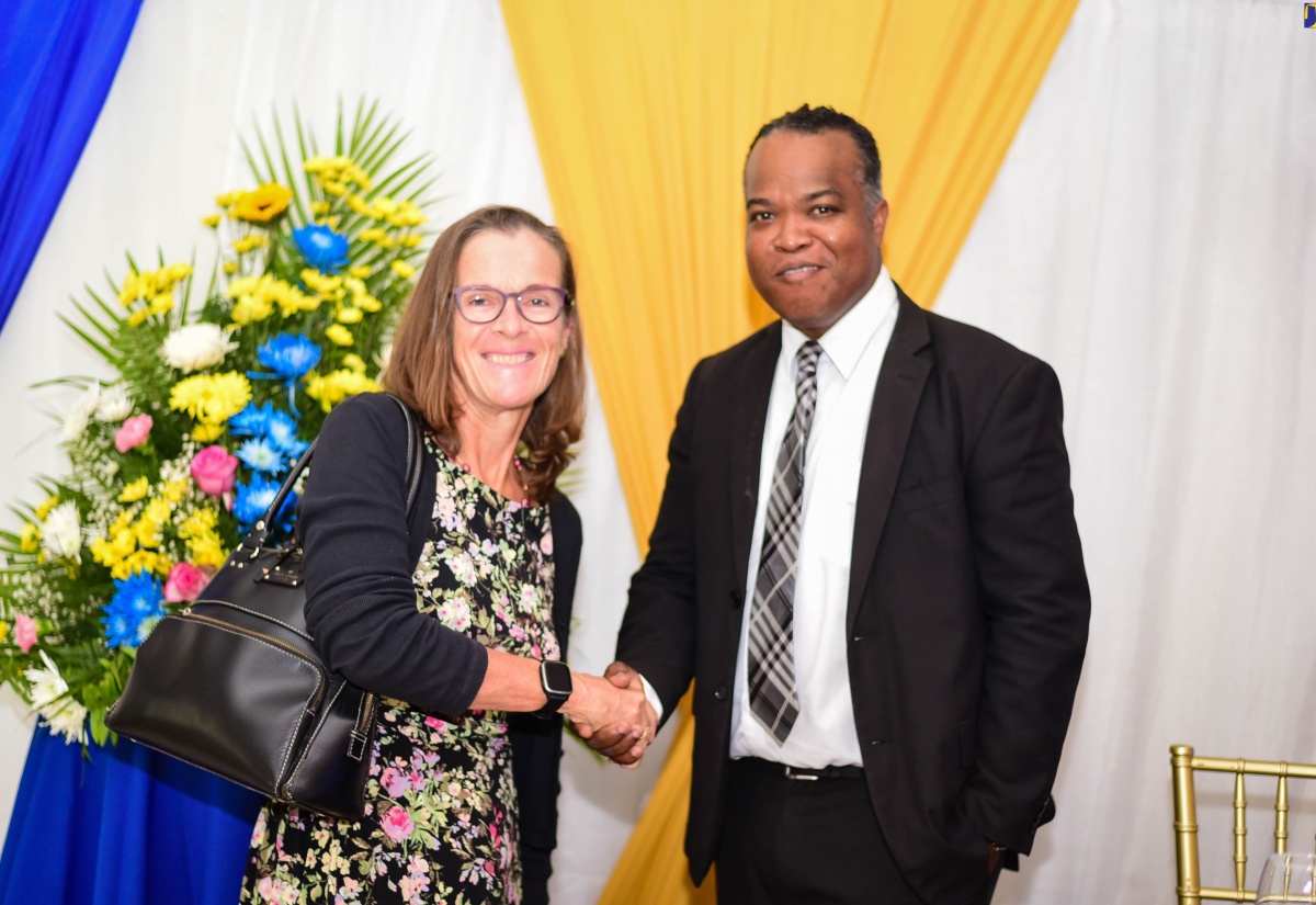 Director, Corruption Prevention, Stakeholder Engagement and Anti-Corruption Strategy, Integrity Commission, Ryan Evans, greets British High Commissioner to Jamaica, Her Excellency Judith Slater, at a National Consultation Workshop held at the Terra Nova All-Suite Hotel in Kingston on Friday (July 19). The workshop was organised by the Integrity Commission.

