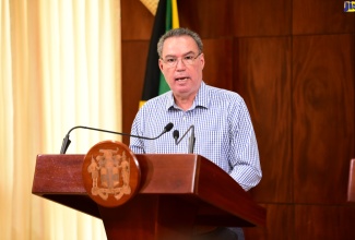 Minister of Science, Energy, Telecommunications and Transport, Hon. Daryl Vaz, addresses yesterday’s (July 24) post-Cabinet press briefing at Jamaica House.