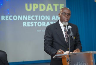 Communications and Customer Service Manager at the National Works Agency (NWA), Stephen Shaw, addresses the Ministry of Science, Energy, Telecommunications and Transport’s July 8 press conference at the Petroleum Corporation of Jamaica (PCJ) Auditorium in New Kingston.

