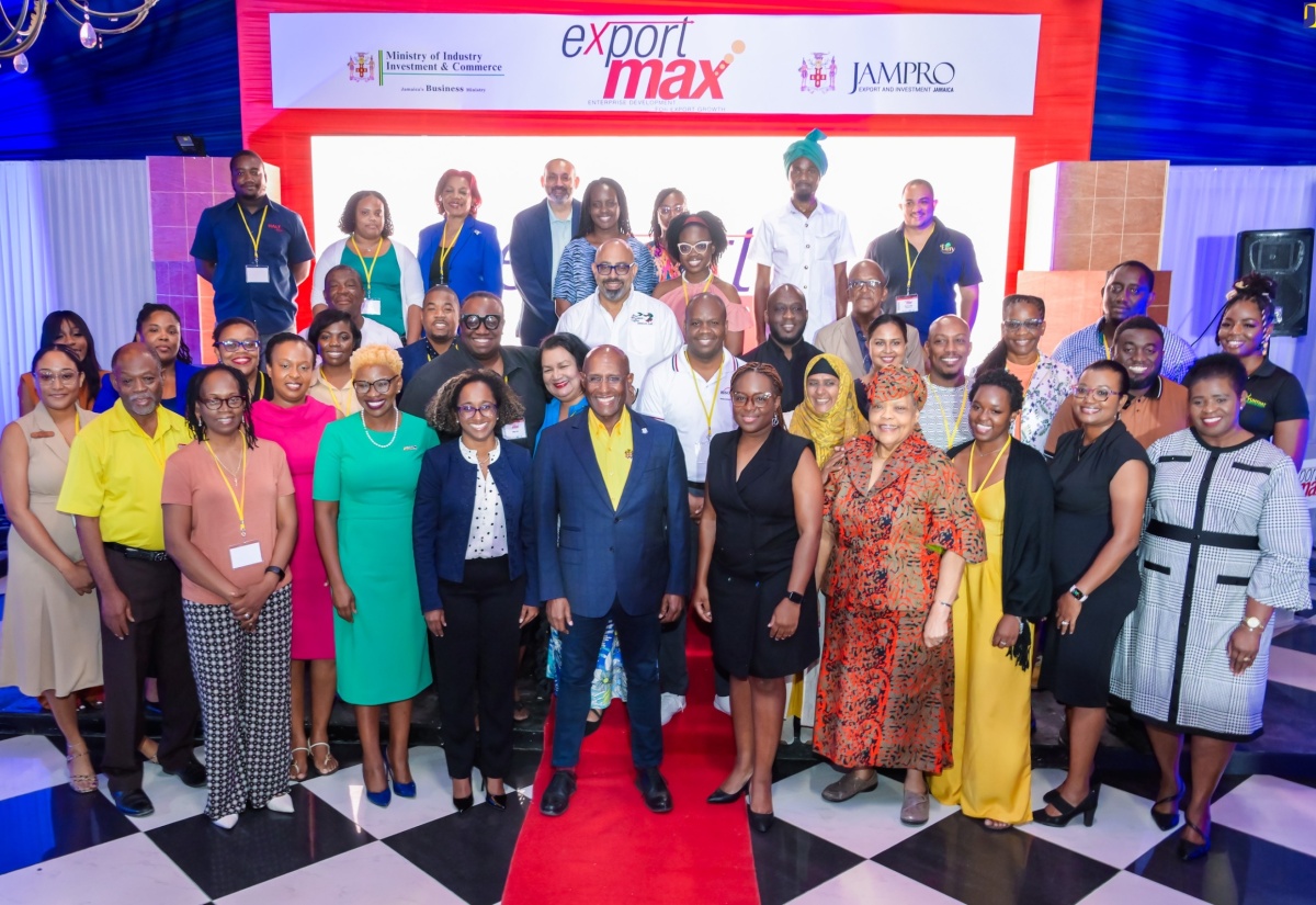 Industry, Investment and Commerce Minister, Senator the Hon. Aubyn Hill (fourth left, front row), and Jamaica Promotions Corporation (JAMPRO) President, Shullette Cox (third left, front), with representatives of the 57 companies onboarded under phase four of JAMPRO’s EXPORT MAX Programme, and other stakeholder interests. The occasion was Tuesday’s launch of EXPORT MAX IV at the Terra Nova All-Suite Hotel in Kingston. Other participants include Executive Director, Jamaica Manufacturers and Exporters Association (JMEA), Kamesha Blake (fifth right, front row), and Chief Executive Officer, Jamaica Business Development Corporation (JBDC), Valerie Viera (fourth right, front row).