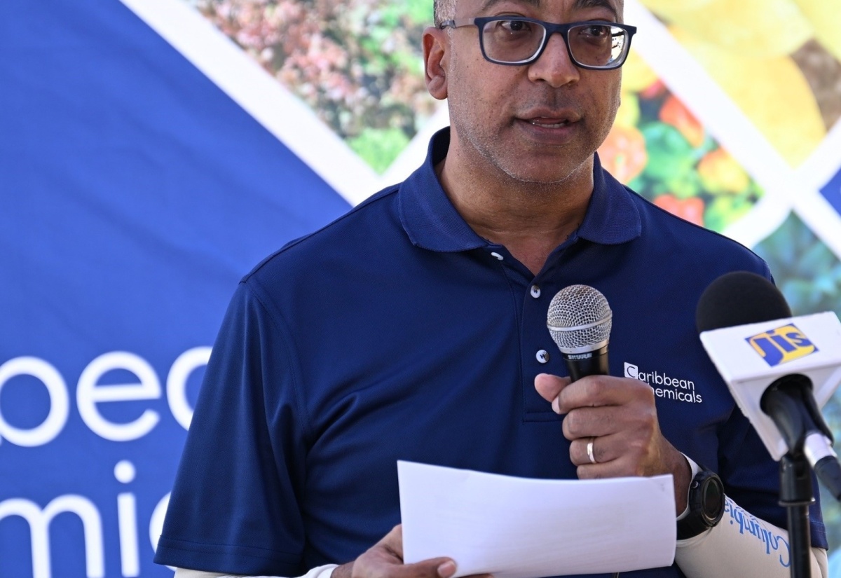 Caribbean Chemicals Jamaica's Managing Director, Graham Dunkley, addresses a function for the hand over of agricultural inputs to farmers in St. Elizabeth at  M&K Farm Supplies in Nain on Thursday, July 25.