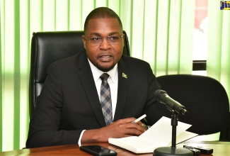 Minister Without Portfolio in the Ministry of Economic Growth and Job Creation with Responsibility for Works, Hon. Robert Morgan, speaking during a meeting of the National Disaster Risk Management Council (NDRMC) at the Ministry of Local Government and Community Development in Kingston on Monday (July 1).