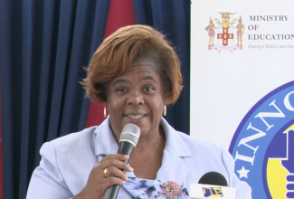 Regional Director for the Ministry of Education and Youth’s Region 4, Dr. Michele Pinnock, speaking at the recent ribbon-cutting ceremony for the official handover of the Esher Primary School smart room at the institution in Hanover.

