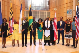 Jamaica’s Ambassador to the United States, Her Excellency Audrey Marks (fifth left) and Minister of Webster Memorial United Church, Rev. Astor Caryle (sixth left), with flag bearers at last year’s Service of Thanksgiving for the Emancipation/Independence observance, at the Sligo Seventh-day Adventist Church, Takoma Park, Maryland.

