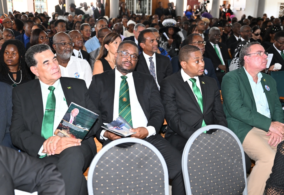 Government Ministers at the funeral service for late Universal Service Fund (USF) Chief Executive Officer, Dr. Daniel Dawes, held at the Holiness Born Again Church of Jesus Christ Apostolic in Savanna-la-Mar, Westmoreland, on June 29. They include (from left): Minister of State in the Ministry of Science, Energy, Telecommunications and Transport, Hon. William James Charles (J.C.) Hutchinson; Minister of State in the Office of the Prime Minister (West), Hon. Homer Davis; Deputy Speaker of the House of Representatives, Heroy Clarke; Minister of Agriculture, Fisheries and Mining,  Hon. Floyd Green; and Minister of Science, Energy, Telecommunications and Transport, Hon. Daryl Vaz.