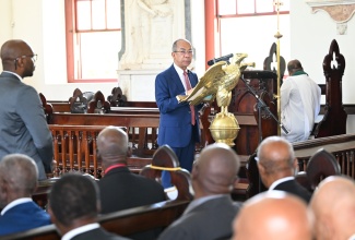 Minister of National Security, Hon. Dr. Horace Chang, addresses the 30th Anniversary Church Service of the Association of Past Members of the Jamaica Constabulary Force (APMJCF) Benevolent Society Chapter One, held recently at St. James Parish Church in Montego Bay. 