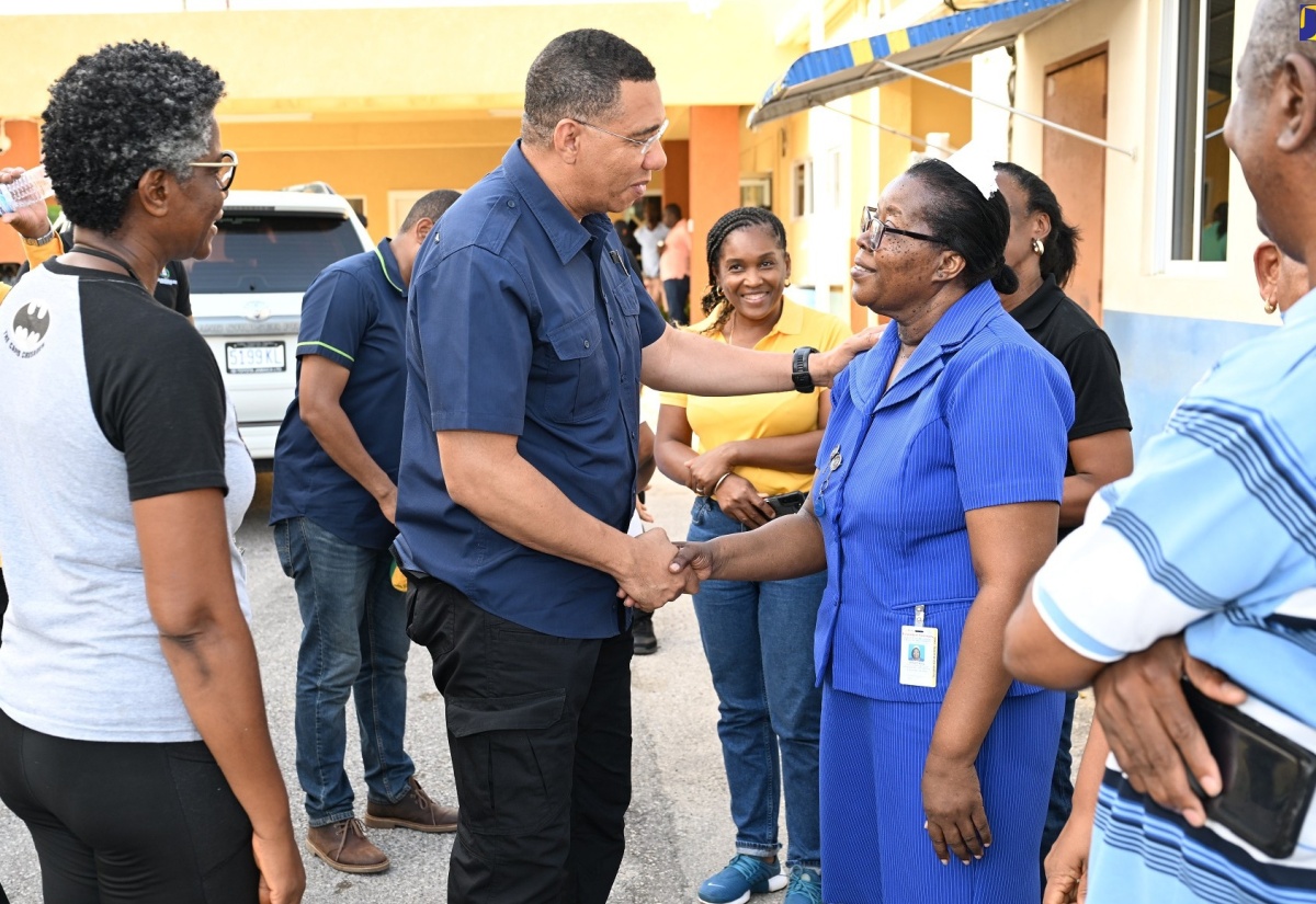 Prime Minister, the Most Hon. Andrew Holness, greets Director of Nursing Services at the Black River Hospital in St. Elziabeth, Maria Stampp, during a visit to the parish on Thursday (July 4) to view and assess damage resulting from Hurricane Beryl’s passage.