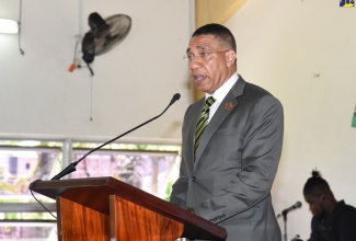 Prime Minister, the Most Hon. Andrew Holness, reads the first lesson during Sunday’s (July 28) National Emancipation and Independence Thanksgiving Church Service held at Grace Missionary Church in Kingston.