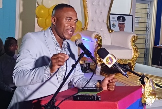 Newly installed commander of the Area Five Police Division, Acting Assistant Commissioner of Police (ACP), Christopher Phillips, addresses a function at the Greater Portmore Police Station, where he was recently honoured for sterling leadership of the St. Catherine South Division.

