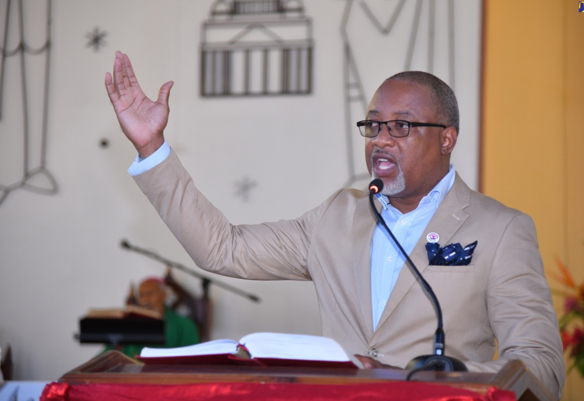 Permanent Secretary in the Ministry of Health and Wellness, Dunstan Bryan, leads the congregation of Sts. Peter and Paul Roman Catholic Church in St. Andrew in the singing of a hymn during Sunday’s (July 21) Healthcare Workers Appreciation Month National Church Service. The Month is being observed throughout July. This is the third year that the Month is being commemorated, following a Proclamation by Governor-General, His Excellency the Most Hon. Sir Patrick Allen, in 2022.