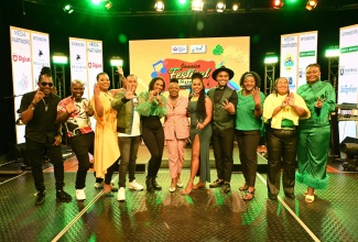 Minister of Culture, Gender, Entertainment and Sport, Hon. Olivia Grange (centre), with the top-10 finalists in this year’s Jamaica Festival Song Competition, during a Presentation Show aired on Television Jamaica on Thursday, June 27. From left are Reggae Maxx, Renzzah, Auraiyah Hope, Lex MD, Pepita, TrishMaq, Casey Donaldson, Sister Novlette, Kimiela “Candy” Isaacs, and Trisstar.

