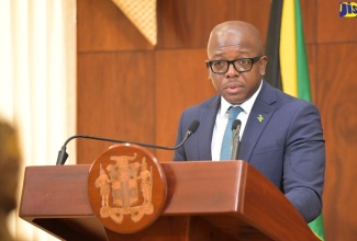 Minister of Labour and Social Security, Hon. Pearnel Charles Jr., addresses Wednesday’s (July 10) post-Cabinet press briefing at Jamaica House. 

