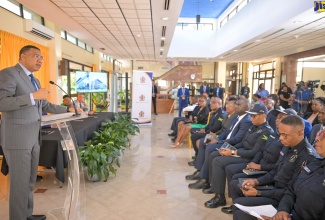 Prime Minister, the Most Hon. Andrew Holness, addressing the contract-signing ceremony for the new St. Catherine North Divisional Headquarters for the Jamaica Constabulary Force (JCF), at the Office of the Prime Minister in St. Andrew on July 23.

