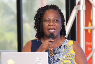 Senior Medical Officer at the St. Ann’s Bay Regional Hospital, Dr. Tanya Hamilton-Johnson, addresses the hospital’s 10th Annual Scientific Conference at the Bettino’s al Mare Restaurant in Drax Hall, St. Ann, on Sunday, July 21.

