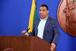 Prime Minister, the Most Hon. Andrew Holness, addresses a press conference at the Office of the Prime Minister in St. Andrew, on August 14.

