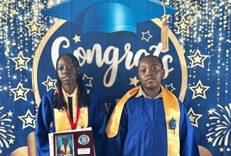 Top Girl at the Portland based Buff Bay Primary School, Alesha Grant (left), and Top Boy and Student at the institution, Jeashawn Williams, at the recent graduation ceremony.

