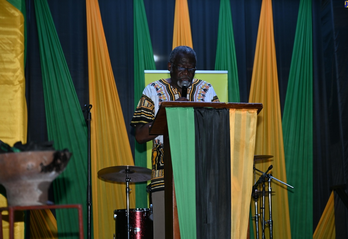 Custos Rotulorum for St. James, Bishop the Hon. Conrad Pitkin, reads a Proclamation at midnight on July 31 declaring Emancipation Day on August 1, during the annual Emancipation Vigil ceremony in Sam Sharpe Square, Montego Bay.