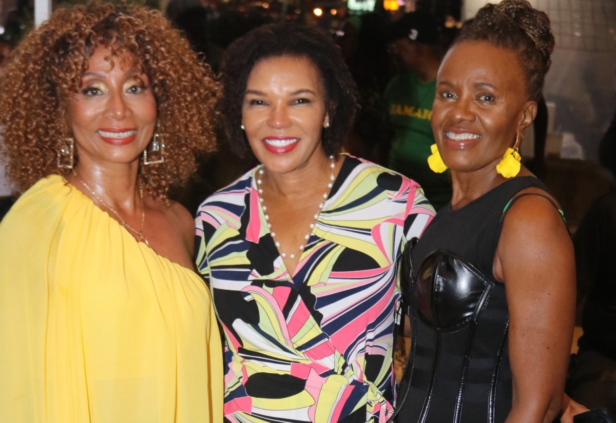 Jamaica’s Ambassador to the United States, Her Excellency Audrey Marks (centre), shares pleasantries with two of the island’s top female entertainers, Nadine Sutherland (left) and Gem Myers, who performed at the third annual ‘Jamaica Fest’ on August 18 at Veteran's Plaza in Silver Spring, Maryland.

