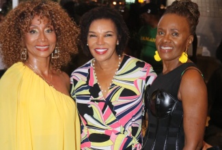 Jamaica’s Ambassador to the United States, Her Excellency Audrey Marks (centre), shares pleasantries with two of the island’s top female entertainers, Nadine Sutherland (left) and Gem Myers, who performed at the third annual ‘Jamaica Fest’ on August 18 at Veteran's Plaza in Silver Spring, Maryland.

