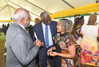 Minister without Portfolio in the Office of the Prime Minister with responsibility for Information, Skills and Digital Transformation, Senator Dr. the Hon. Dana Morris Dixon, engages in conversation with the son of the Right Excellent Marcus Mosiah Garvey, Hon. Dr. Julius Garvey (left), and Chairman of the Marcus Garvey in Schools Foundation, Major (Ret’d) Effiom Whyte. Occasion was a floral tribute to commemorate the 137th anniversary of Marcus Garvey’s birth, held on Saturday (August 17), at National Heroes Park in Kingston. Marcus Garvey, who was Jamaica’s first National Hero,  was born in St. Ann's Bay, St. Ann on August 17, 1887.