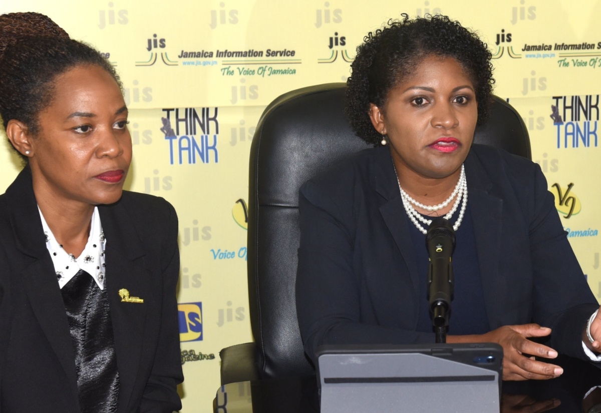 Executive Director, National Education Trust (NET), Latoya Harris Ghartey (right), addresses a recent Jamaica Information Service (JIS) ‘Think Tank’ at the agency’s head office in Kingston. With her is Director of Donor and Partnership Management at NET, Keisha Johnson.