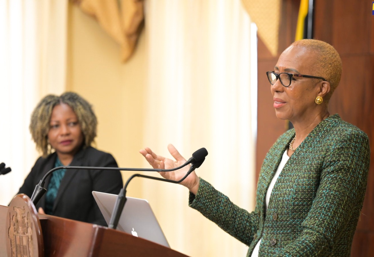 Minister of Education and Youth, Hon. Fayval Williams (right), addresses Wednesday’s (August 28) post-Cabinet press briefing at Jamaica House. Looking on is Minister without Portfolio in the Office of the Prime Minister with Responsibility for Information, Skills and Digital Transformation, Senator Dr. the Hon. Dana Morris Dixon.

